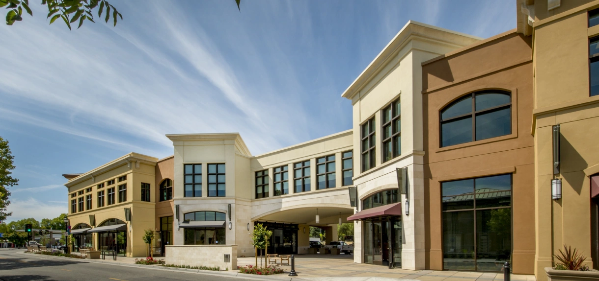 A building with many windows on the side of it.